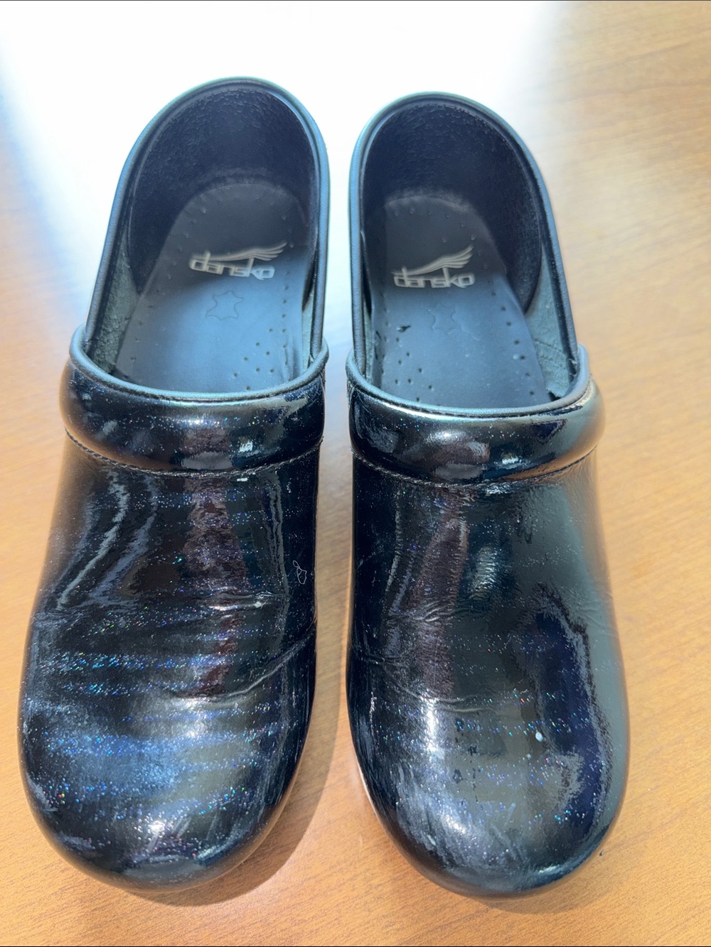 Dansko Black Iridescent Patent Clogs